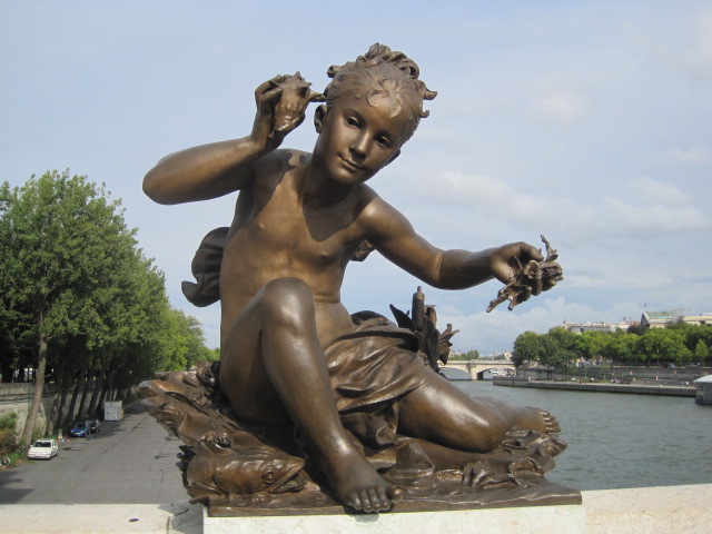 One of the delightful statues on Pont Alexandre III