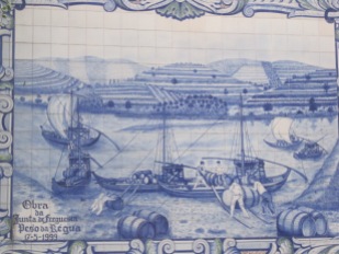 Azulejo panels illustrate the barcos rabelas